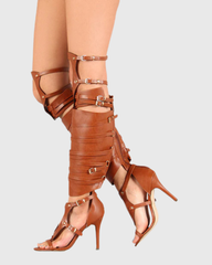 Eloy Leg Wrap Gladiator Sandals In Cognac